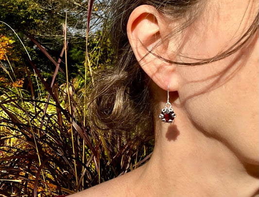 Poppy Earrings Dangles in Garnet and Sterlign silver design of Hannah Daye & Co fine jewelry january birthstone stunning jewels
