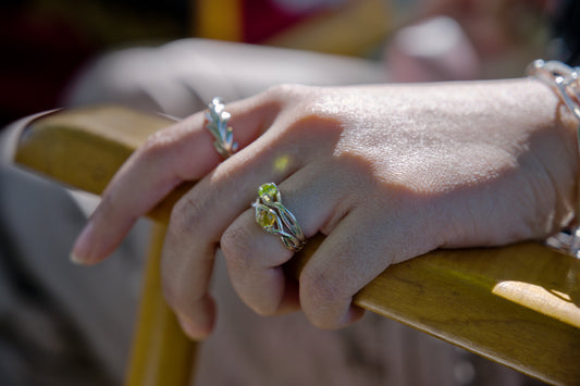 Fiore Stacking Rings shown here in Peridot and Citrine along with the Palm Ring all by Hannah Daye original design jewelry