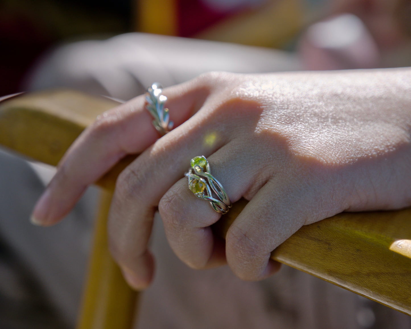 Fiore Stacking Rings shown here in Peridot and Citrine along with the Palm Ring all by Hannah Daye original design jewelry