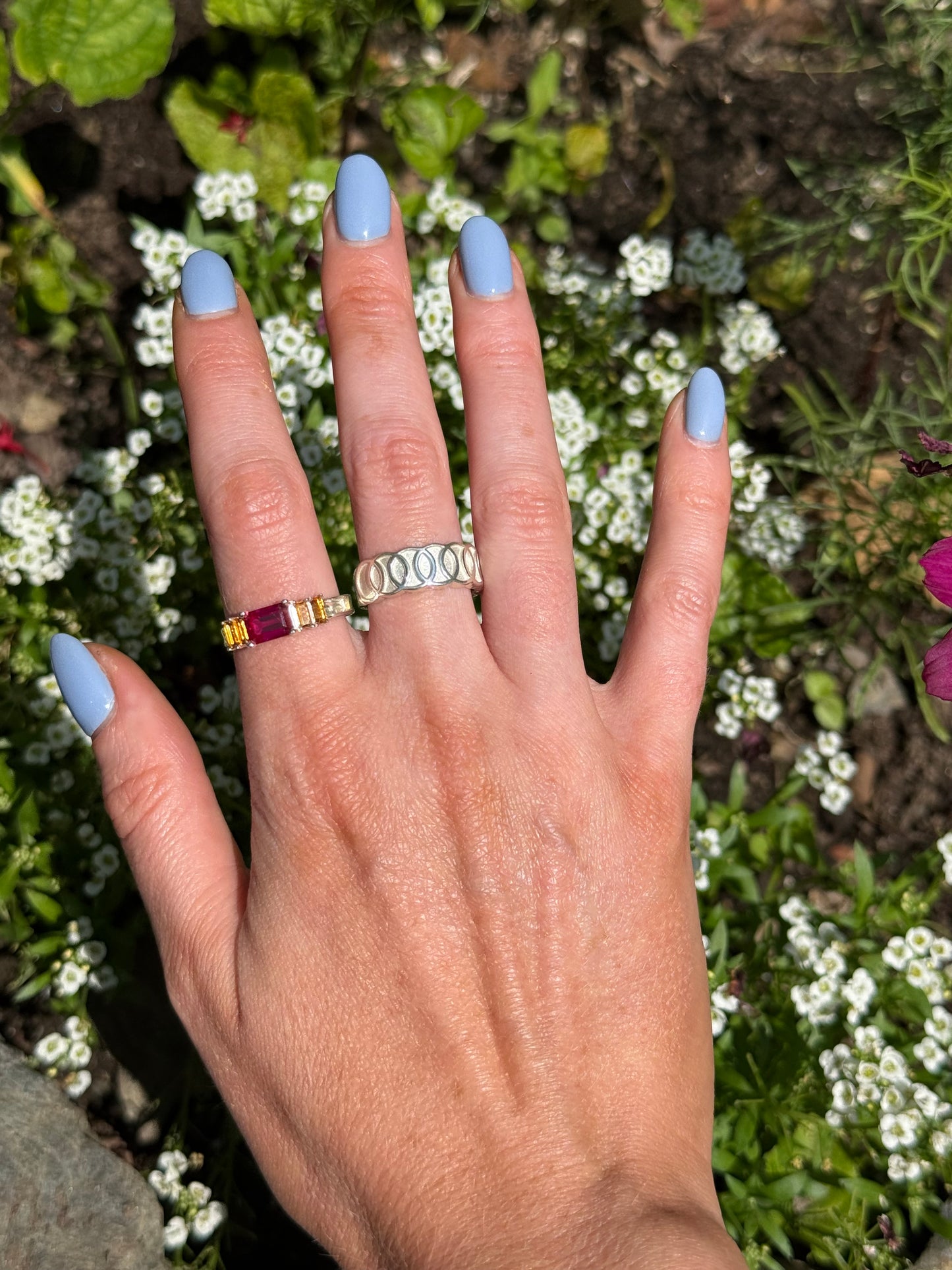wearing Oslo Band Ring with Lexi Band RIng both by Hannah Daye fine jewels