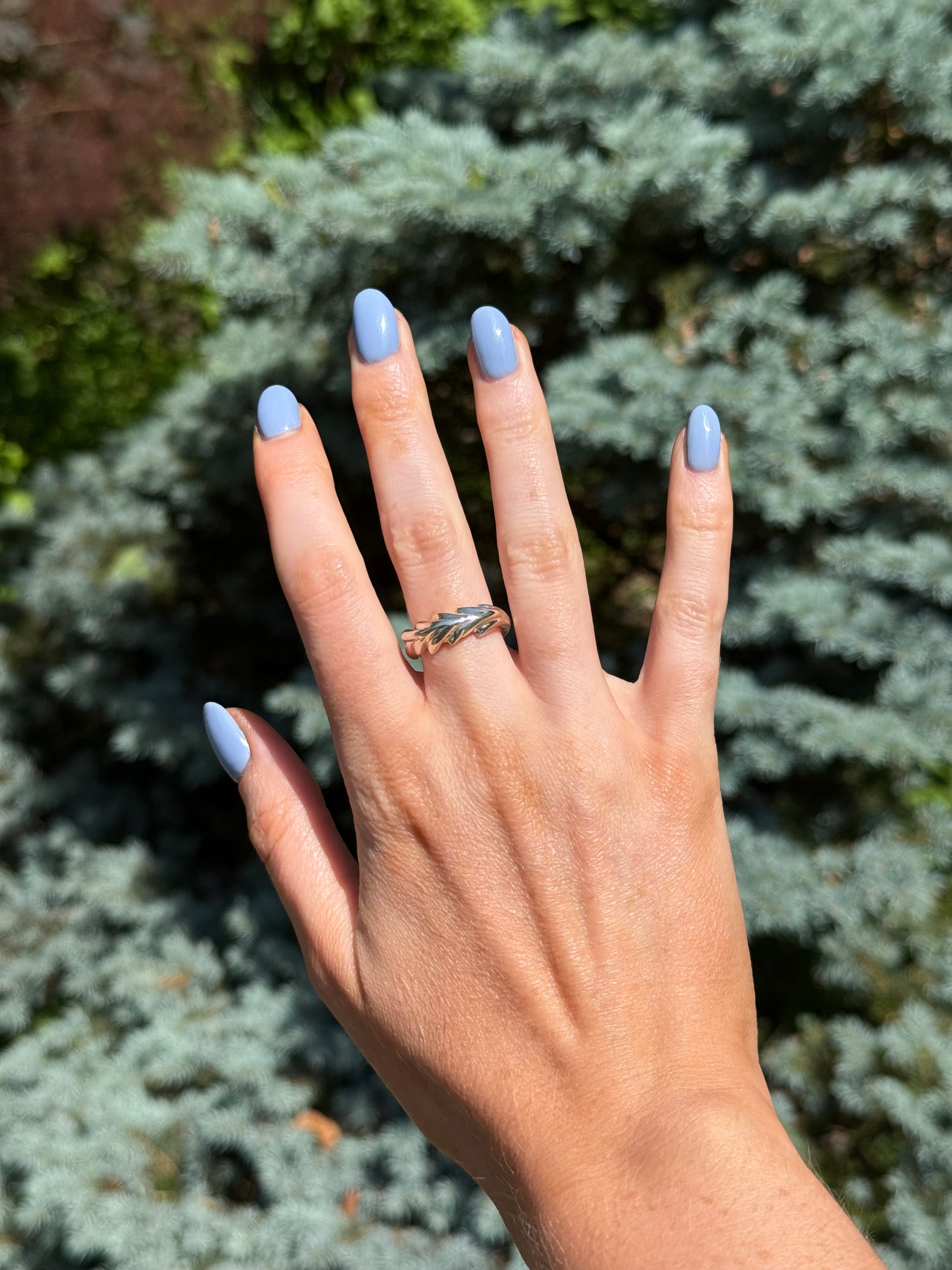 wearing palm leaf ring sterling silver by Hannah Daye fine jewelry