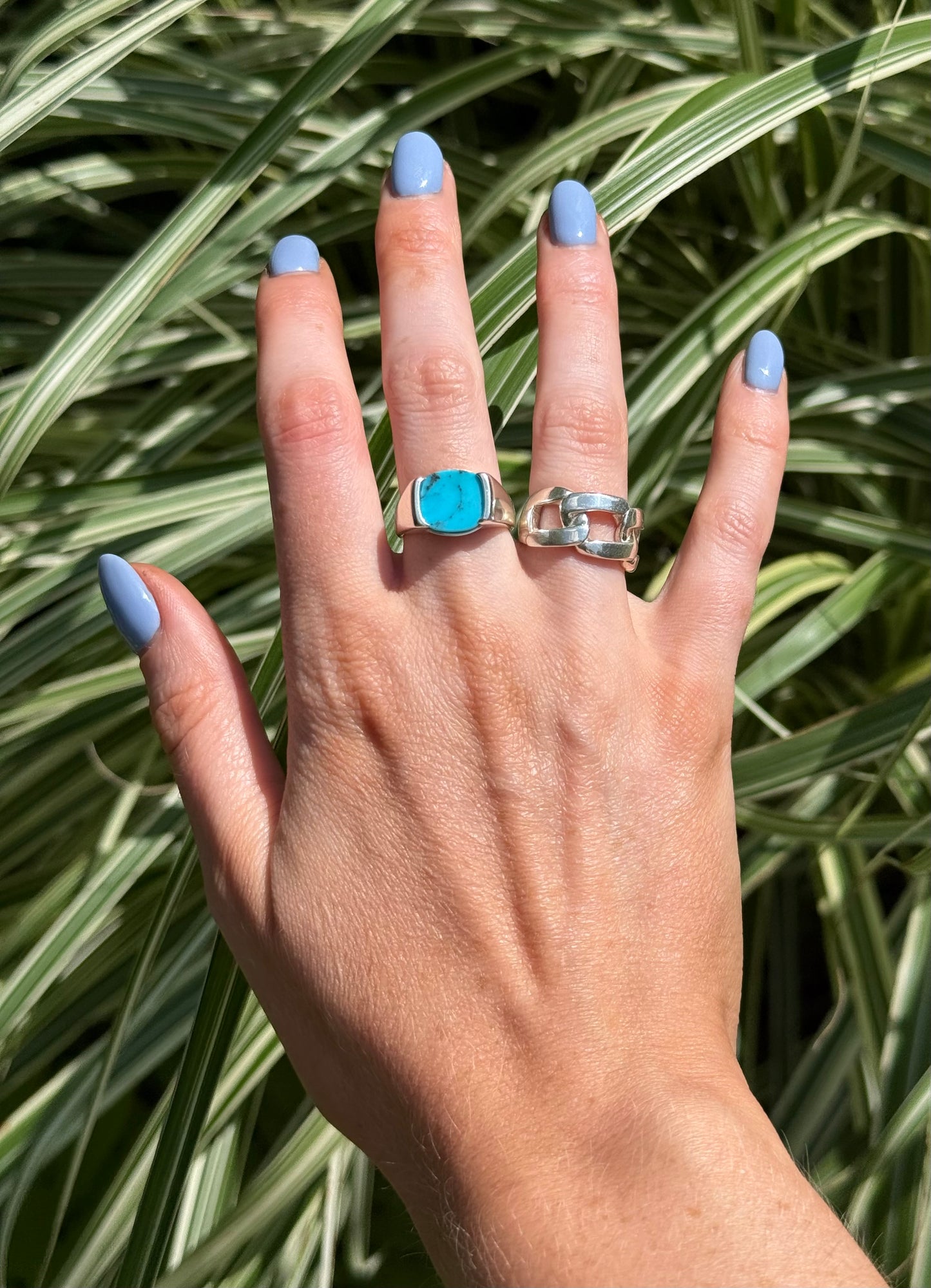 wearing Milan Picollo Turquosie Ring and Bordillo RIng both by Hannah Daye fine jewelry