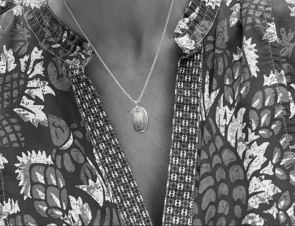 wearing Oslo bezel set pendant by Hannah Daye & Co original design