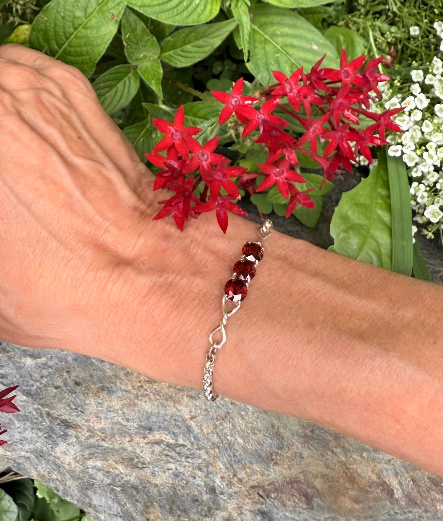 wearing Brillante Bracelet in Garnet by Hannah Daye