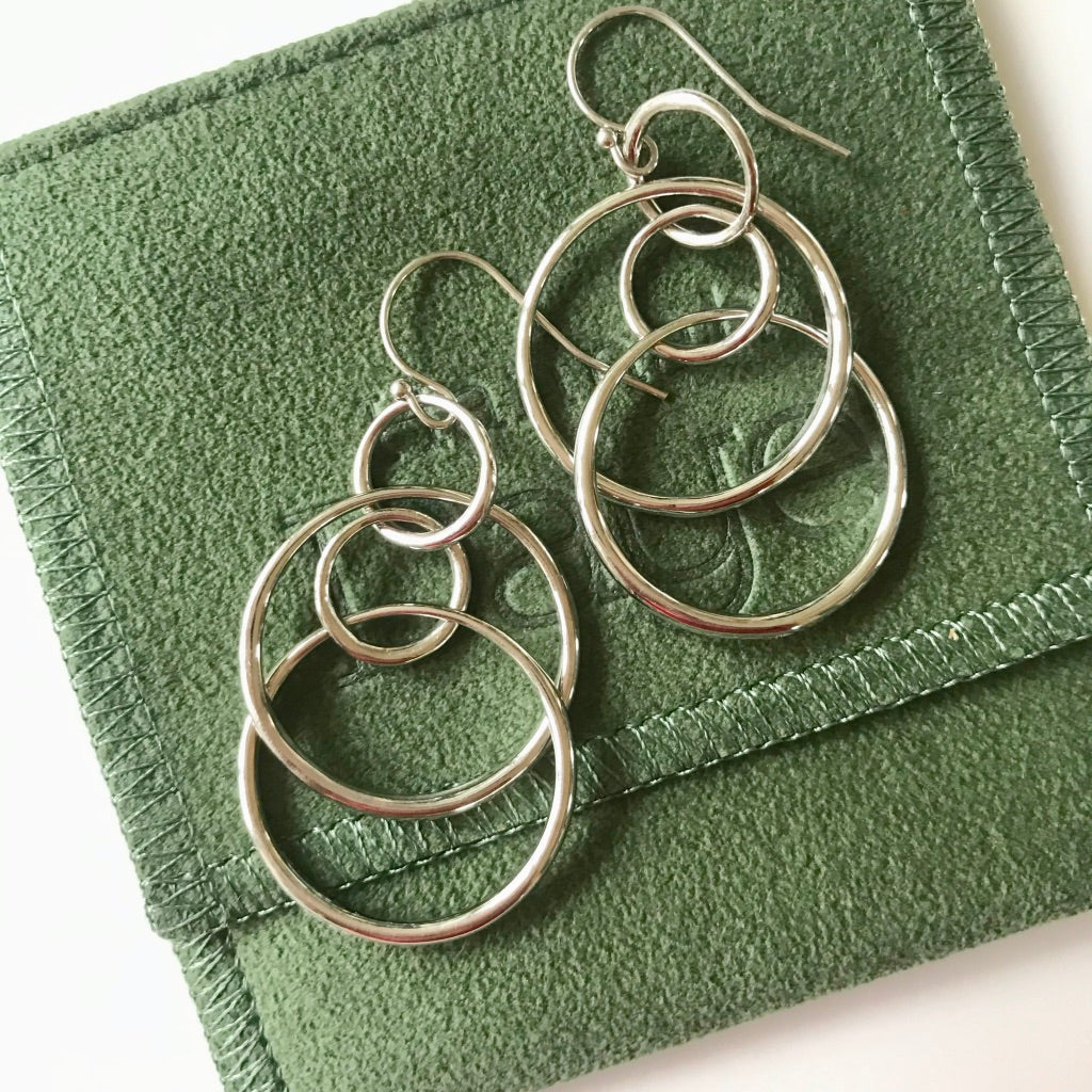 Sterling silver Saturn Singles by Hannah Daye
