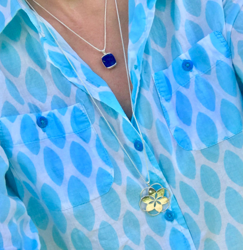 wearing Lapis Milan Pendant by Hannah Daye