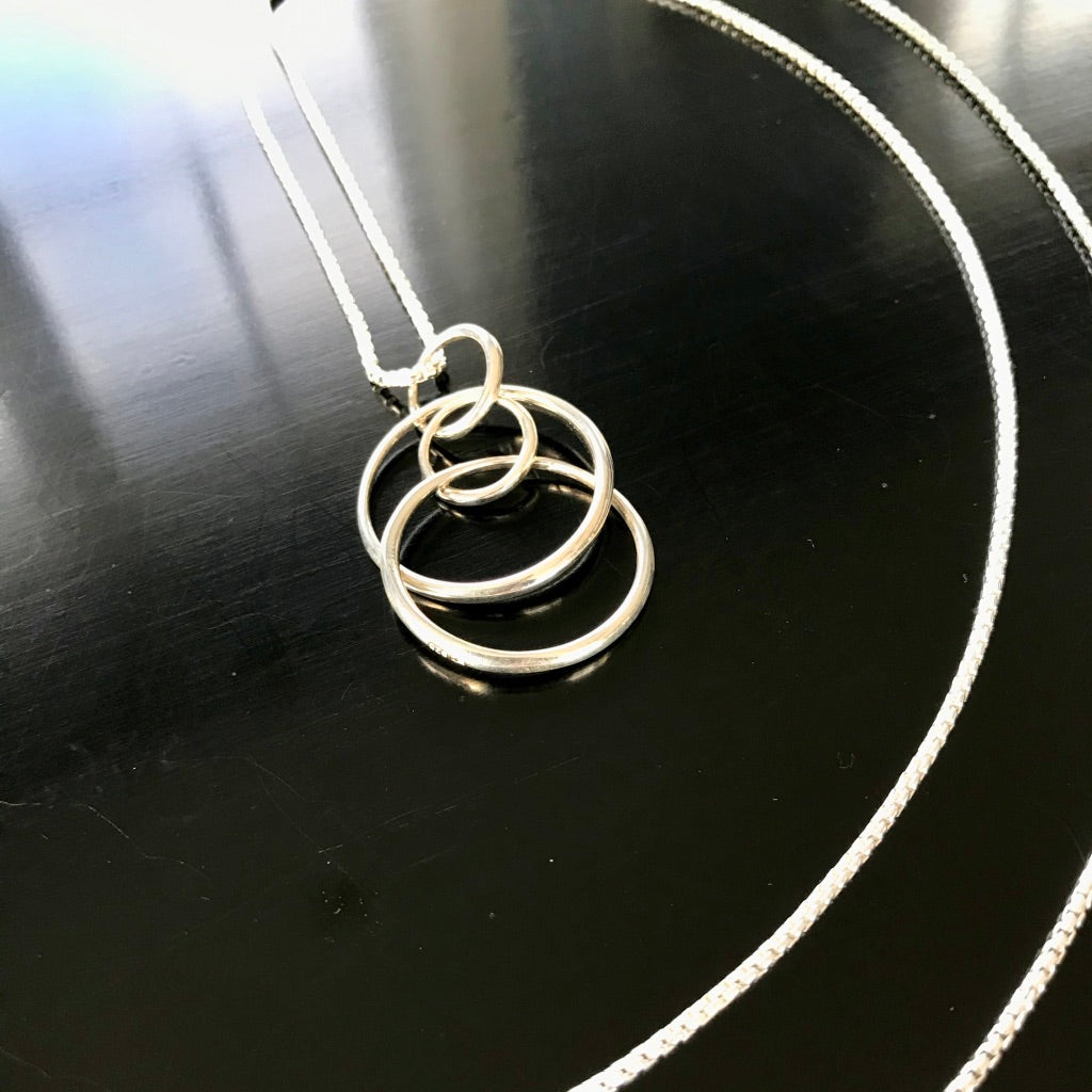 Saturn Pendant by Hannah Daye