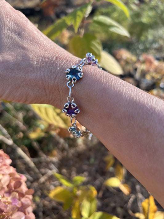 wearing Amethyst and London and Sky Blue Topaz Poppy Bracelet by Hannah Daye & Co