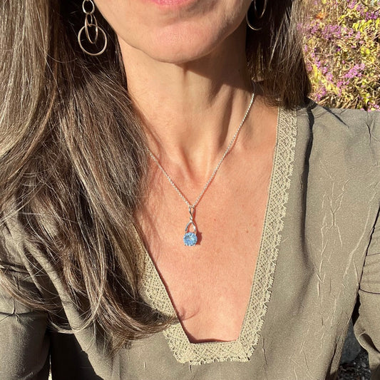 wearing Sky Blue Topaz Brillante Pendant with small guage venetian chain 18"by Hannah Daye & Co