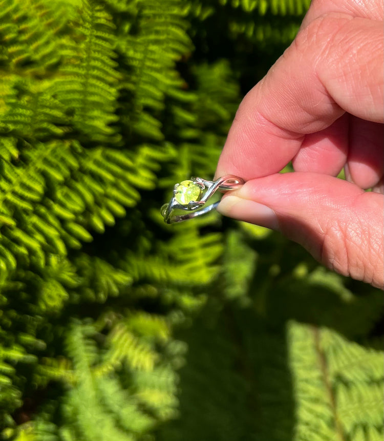 Peridot August Birthstone sterling silver ring Fiore collection fine jewelry by Hannah Daye & CO ferns in background