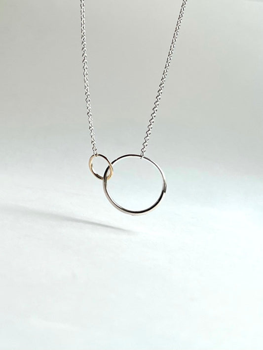 Saturn Necklace mixed metal 14k and sterling silver by Hannah Daye hand crafted fine jewelry