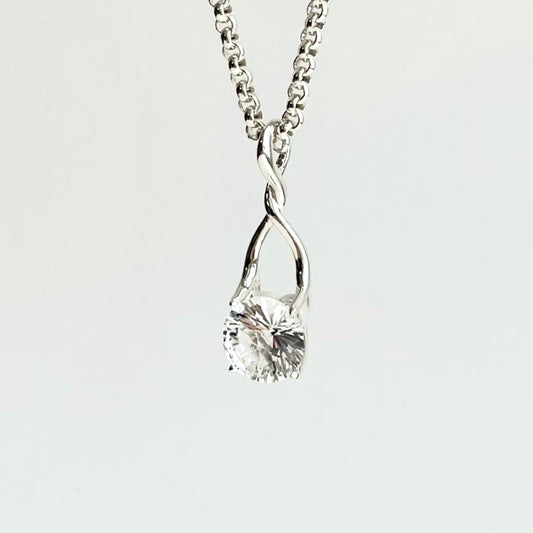 side view Brillante White Topaz pendant by Hannah Daye original design hand cast jewelry