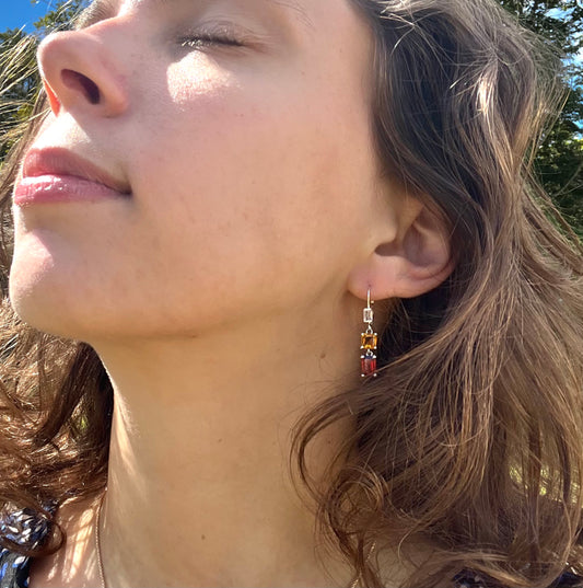 wearing Hannah Daye fine jewelry Lexi Double Drop Earrings in Garnet and Citrine sparkling beauties 