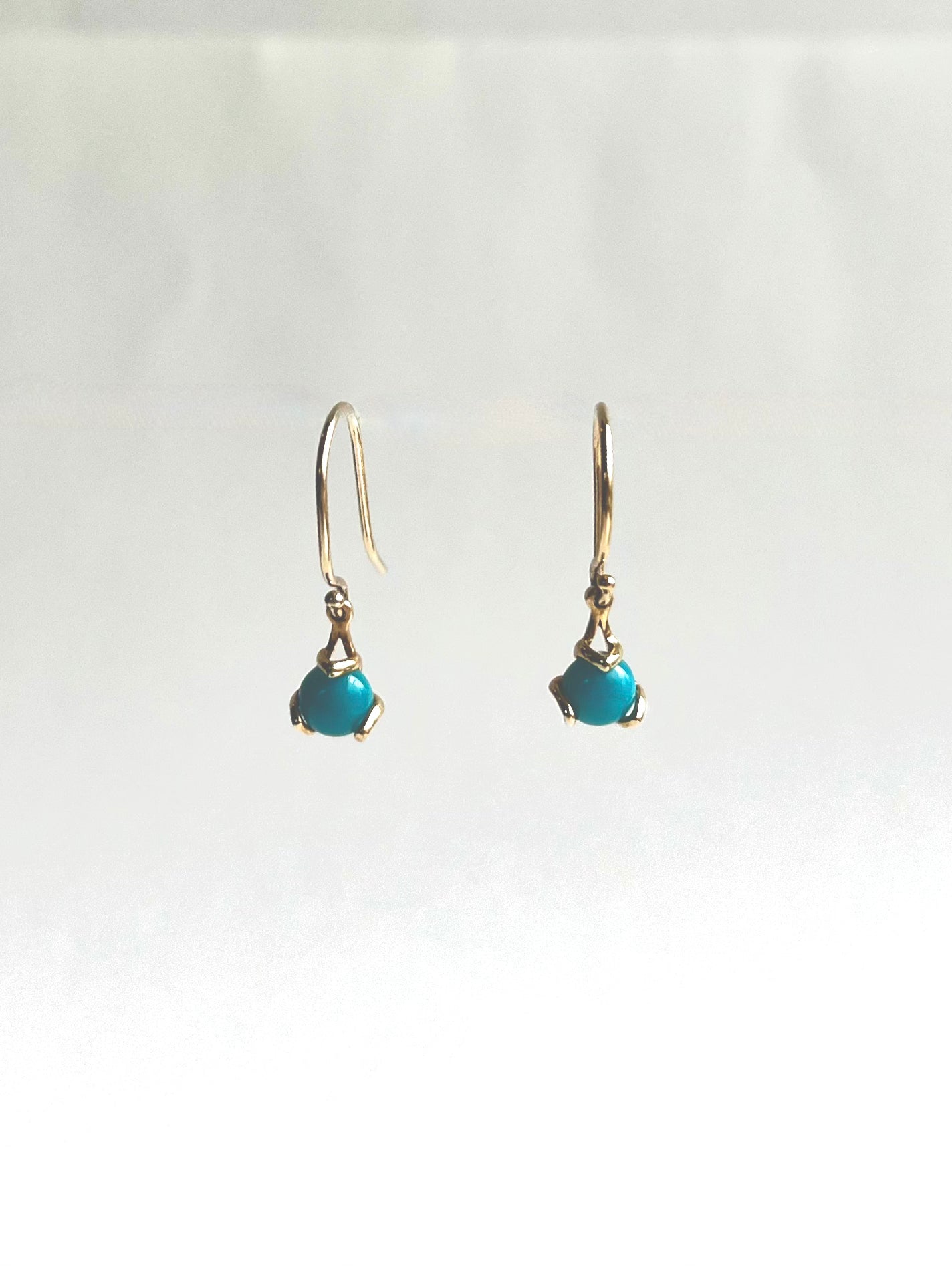 Turquoise set in 14k yellow gold Fiore Drop Earrings by Hannah Daye original design 