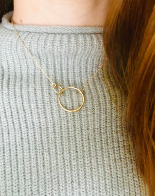 Saturn necklace 14k gold Hannah Daye jewelry