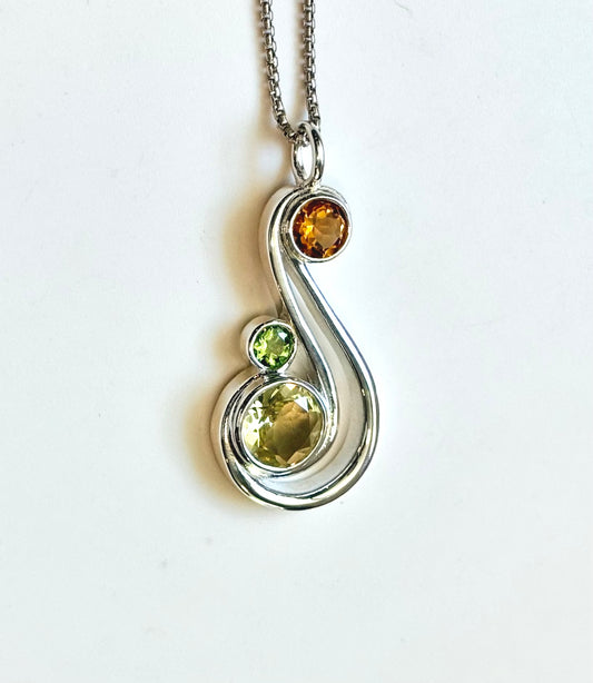 sterling silver pendant with three gemstones 