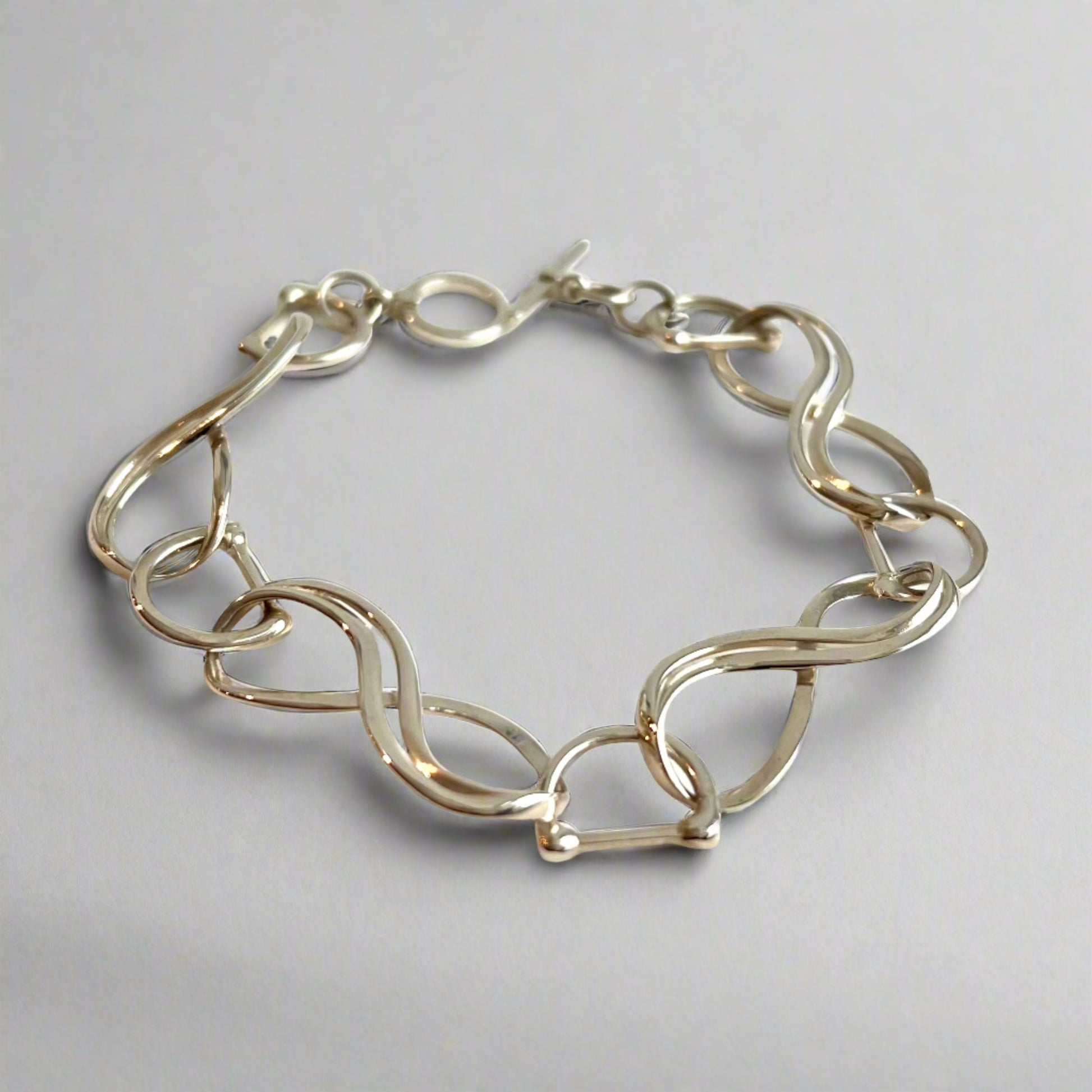 Equestrian Infinity Bracelet sterlign silver hand-crafted original design by Hannah Daye & Co