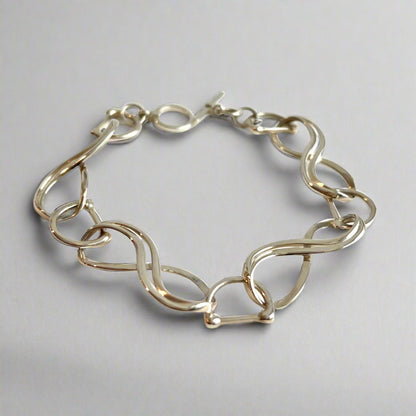 Equestrian Infinity Bracelet sterlign silver hand-crafted original design by Hannah Daye & Co