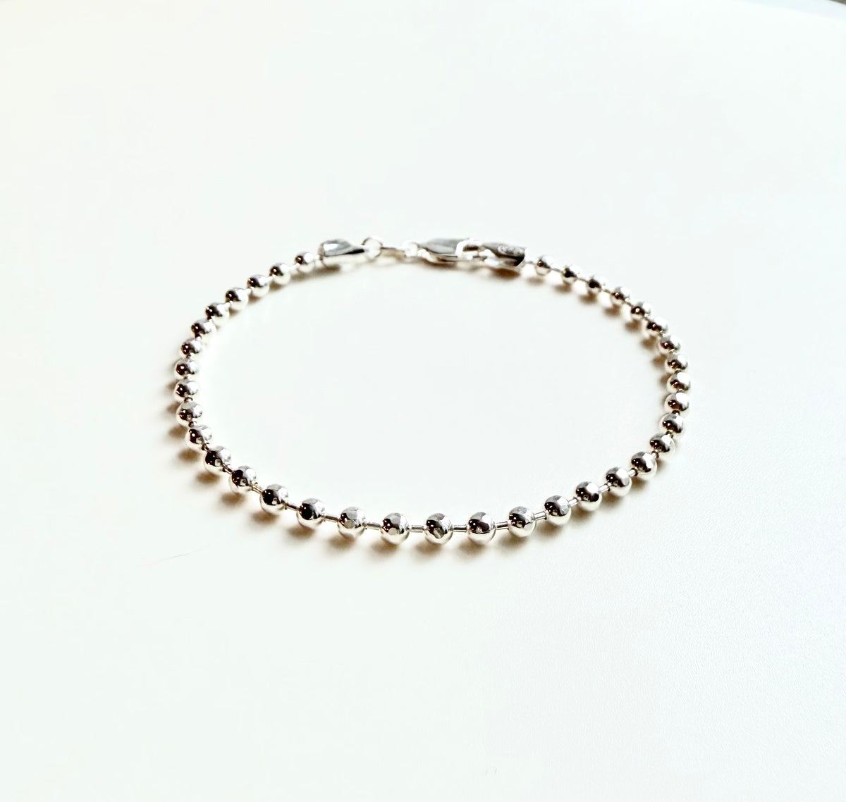 sterling bead chain bracelet on white background