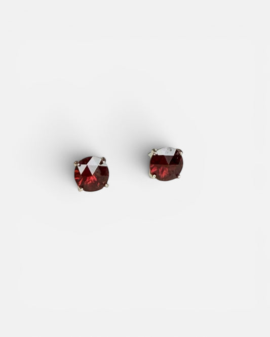 Pair of Red Garnet earrings on White background
