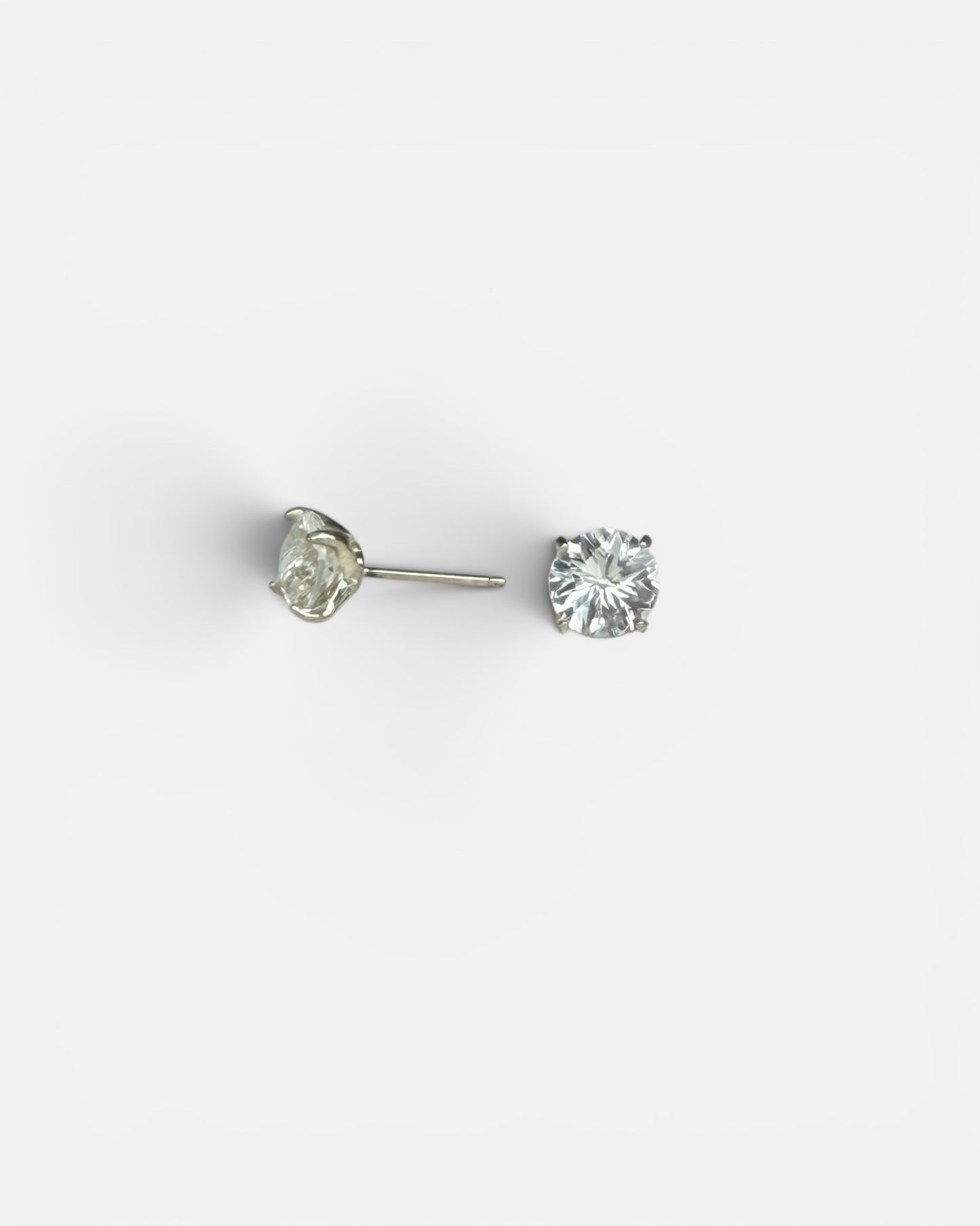 Pair of White Topaz Stud Earrings on white background