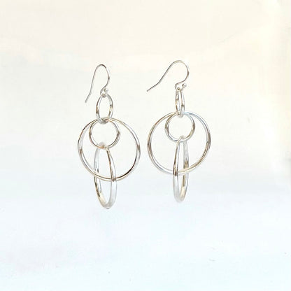 Sterling Silver Saturn Singles by Hannah Daye original design hand cast  earrings dangles hoops