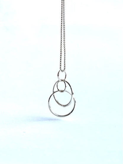 Saturn Pendant Sterling Silver original design by Hannah Daye & Co