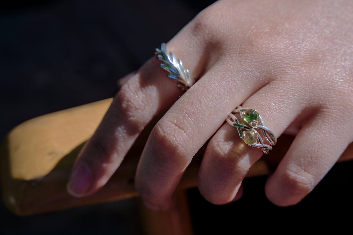 FIore RIngs in Peridot and Citrine Stacked along with Palm Ring all by Hannah Daye fine jewelry