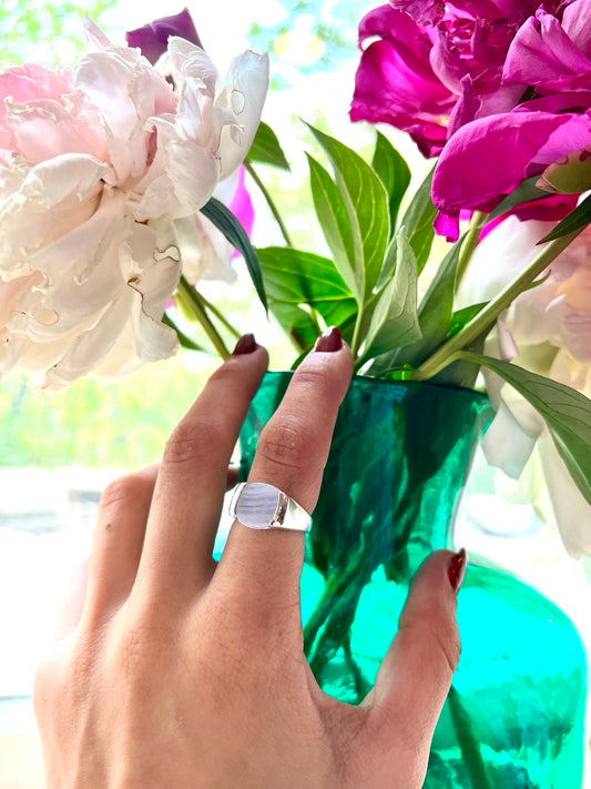 Milan Piccolo Ring in Lavender Agate by Hannah Daye wearing and shown with peonies