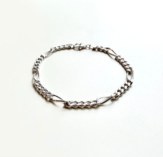 sterlign silver hcain link bracelet on white background