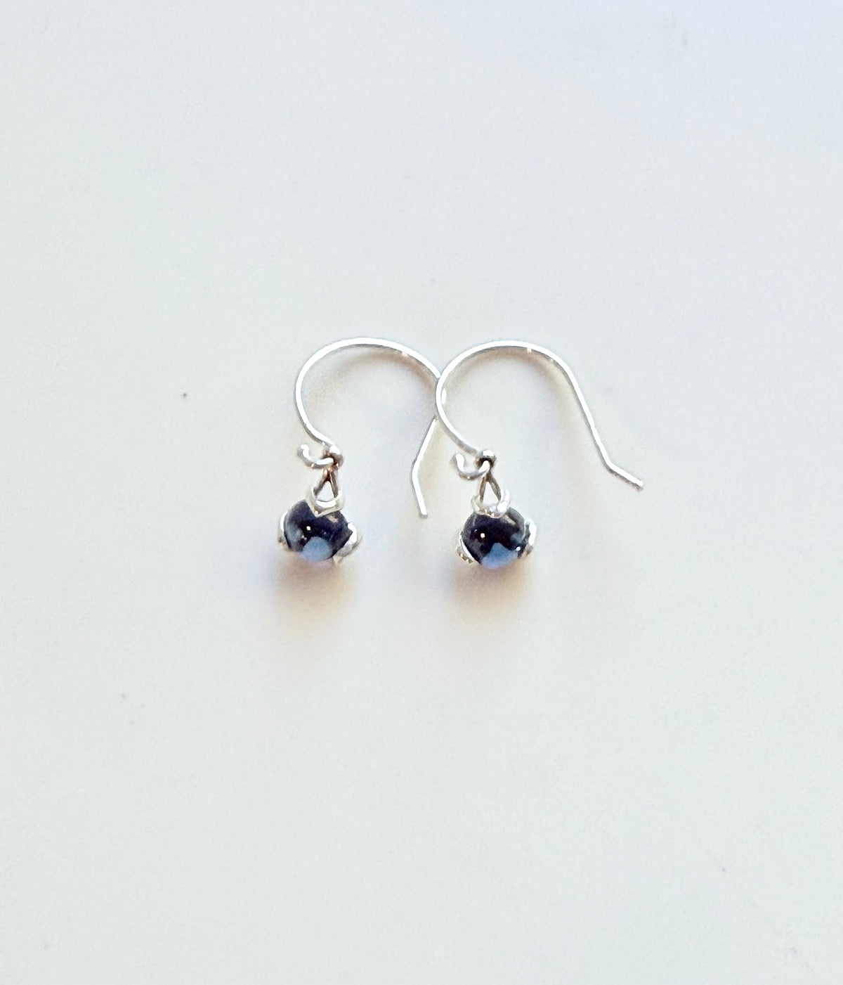silver drop earrings with blue gemstone