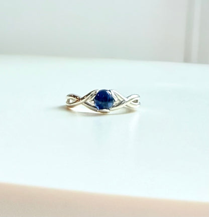 silver ring with blue sapphire stone