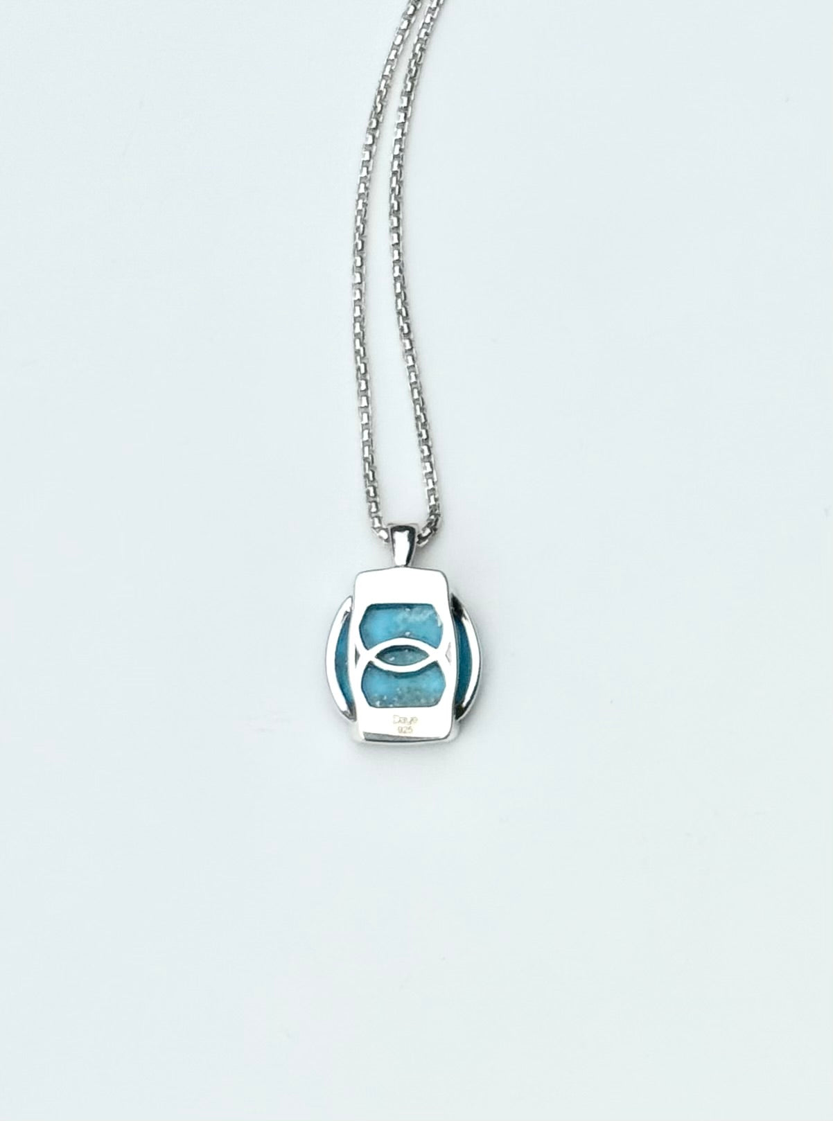 reverse side of pendant showing openwork Milan Turquoise