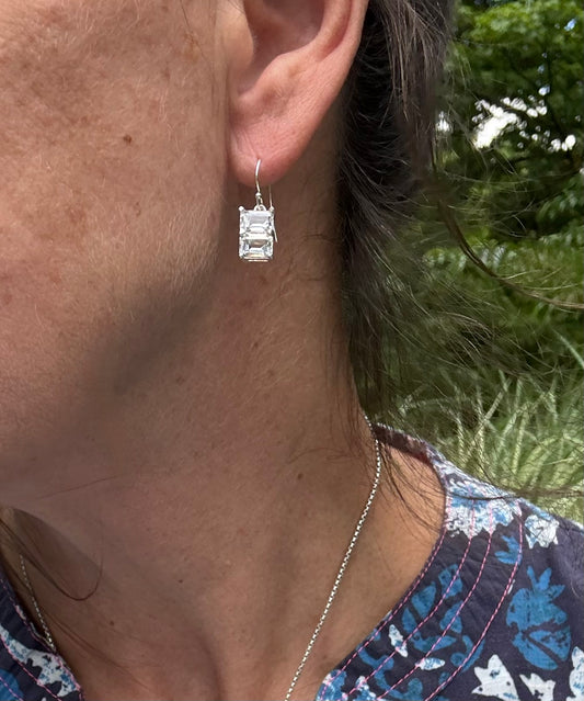 wearing Lexington Drop Earrings stacked emerald-cut gemstones white topaz by Hannah Daye jewels original design