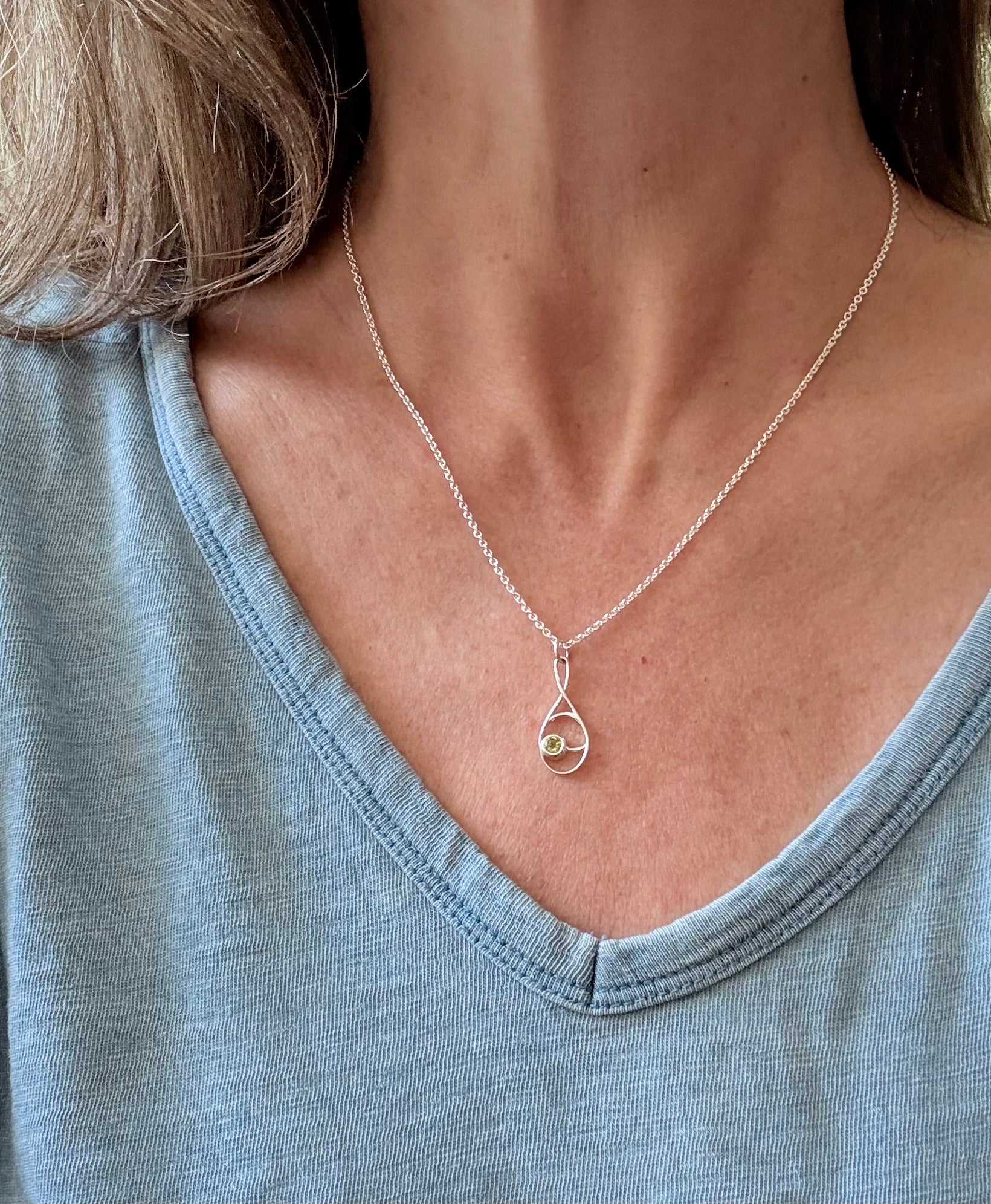 wearing Deuce eridot Pendant by hannah Daye