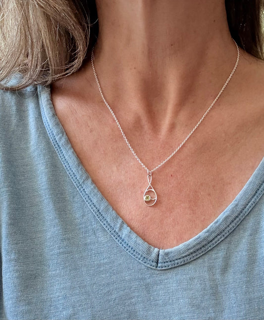 wearing Deuce eridot Pendant by hannah Daye