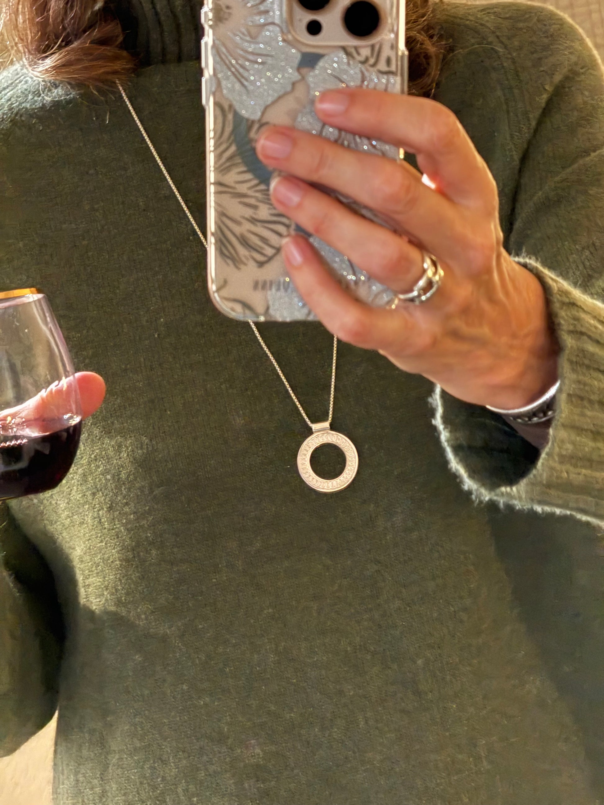 wearing Oslo Pendant and Bordillo Ring both by Hannah Daye & Co original design sterling silver