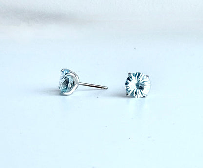 Brillante sterling Silver Earrings with ky Blue Topaz and 14k gold posts by Hannah Daye fine jewels