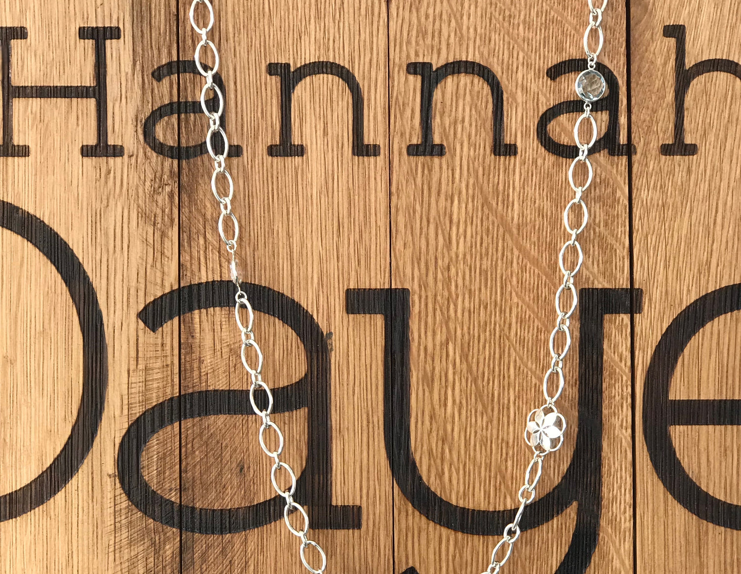 Hannah Daye Burbon Barrel Sign with Cascade Infinity Necklace and Rosette Charm