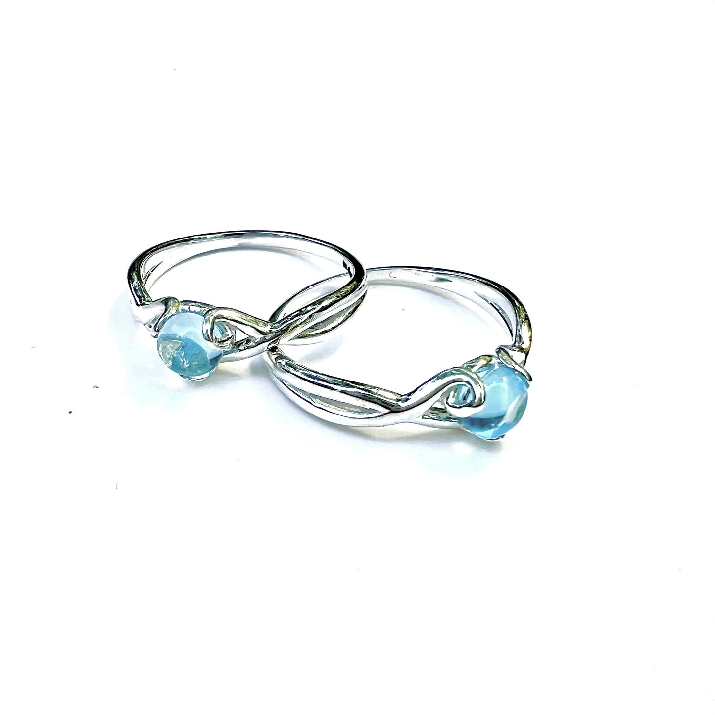 Fiore Sterling Silver Rings in Swiss Blue Topaz by Hannah Daye & Co