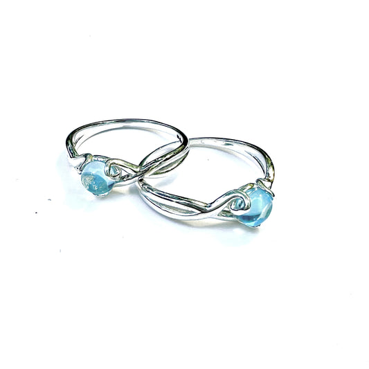 Fiore Sterling Silver Rings in Swiss Blue Topaz by Hannah Daye & Co