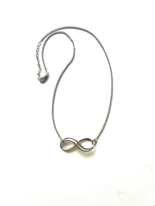 Infinty Charm necklace sterling silver by Hannah Daye original design