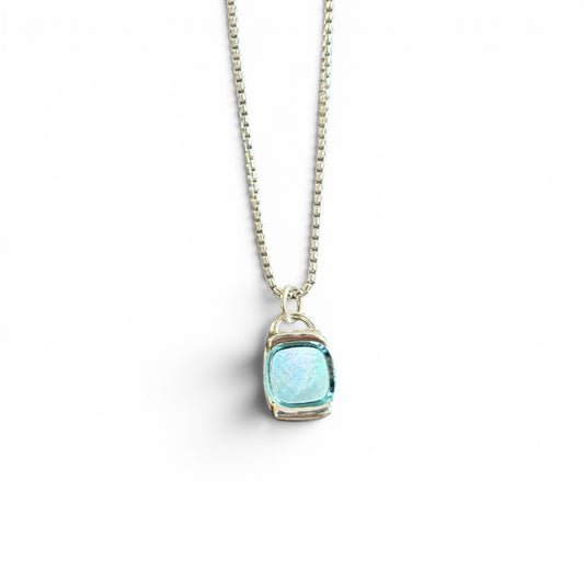 sterling silver Necklace with a blue pendant on a white background