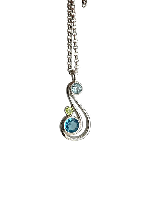 Aria sterling silver pendant with blue topaz and peridot by Hannah Daye