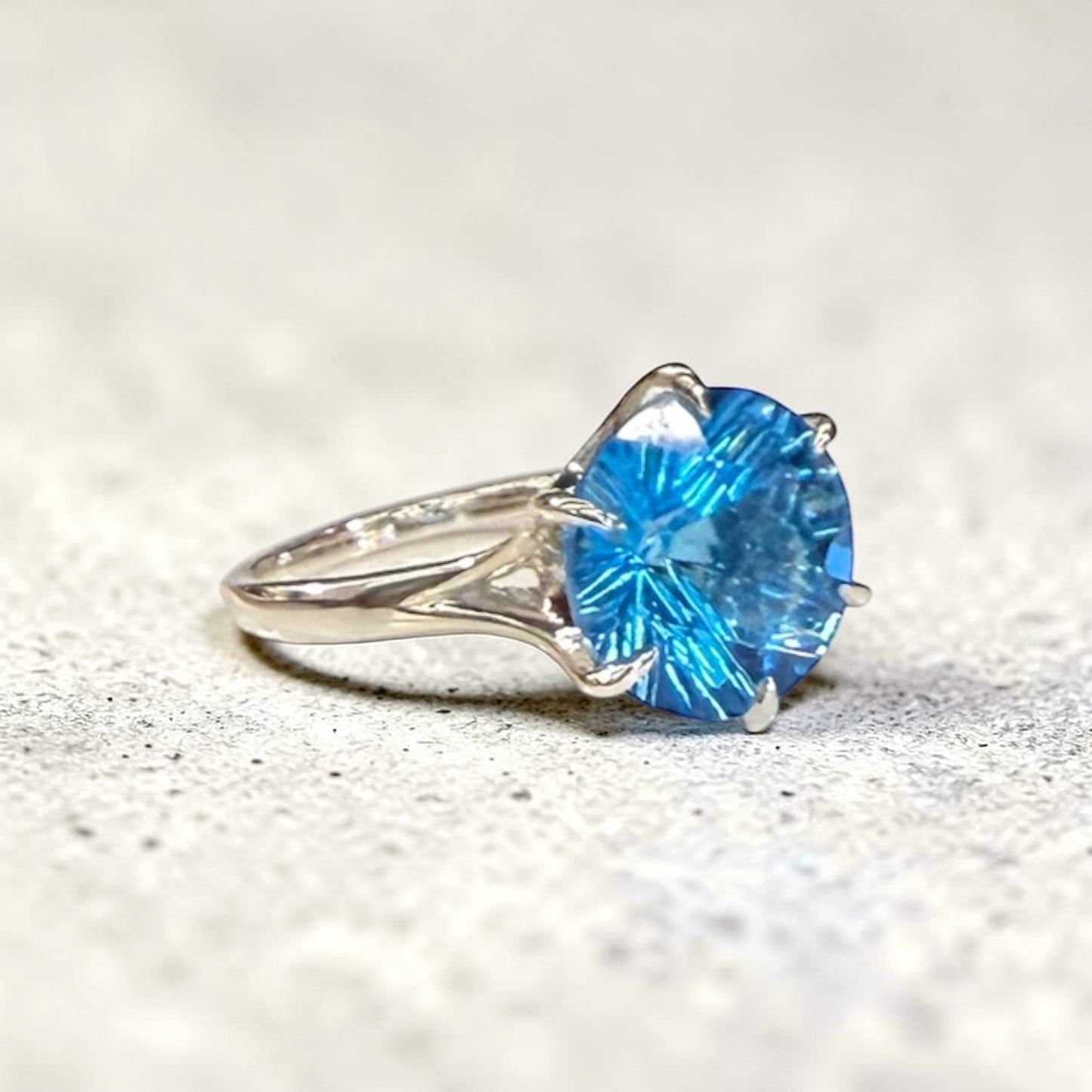 Swiss Blue Topaz Brillante Ring Side View by Hannah Daye & Co
