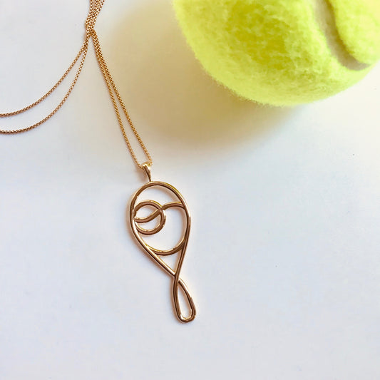 14k gold Grand Deuce Tennis Pendant Raquet and ball motif in 14k gold by Hannah Daye & Co
