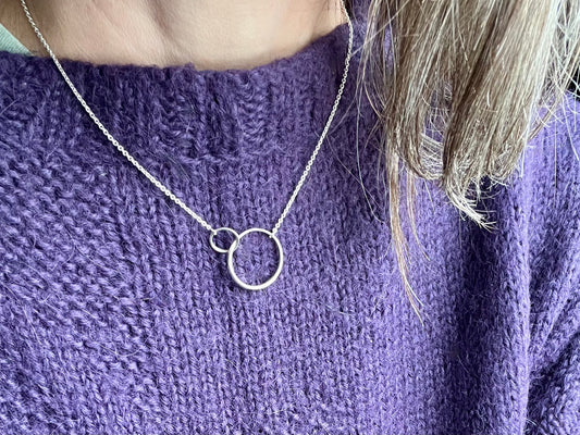 Wearing Saturn Necklace Silver by Hannah Daye & Co