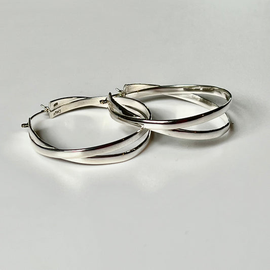 Milan Hoops in Sterling Silver with 14k gold hinge clasp by Hannah Daye & Company