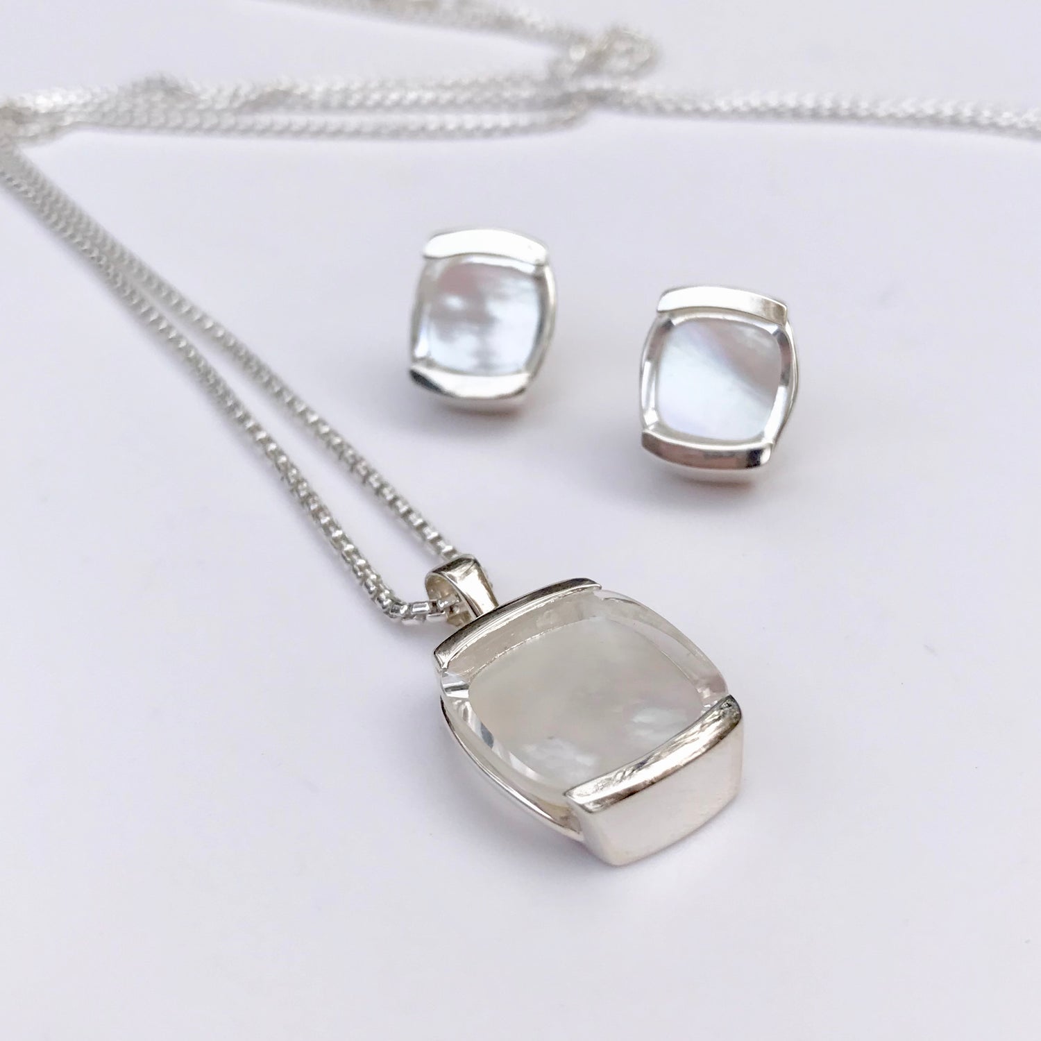 Milan Pendant and Earrings in White Mother of Pearl Doublet by Hannah Daye & Co